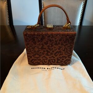 Brandon Blackwood Crystal Leopard Trunk
